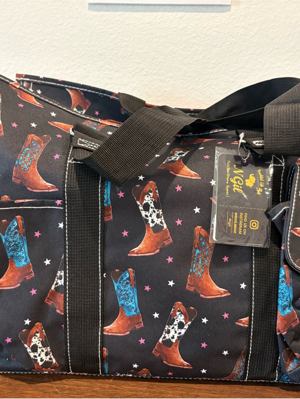 Stylish Black Western Print Duffel Bag with Boot Motif